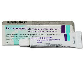 სოლკოსერილი დენტალური ადჰეზიური პასტა